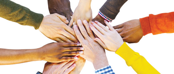 Hands stacked together in teamwork